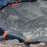 Helicopter view of the Pu'u O'o crater. Click for full size|Perched lava lake in the Pu'u O'o crater on Hawaii (June 26th 2011) - Photo Credits Nathan Forget on Flickr