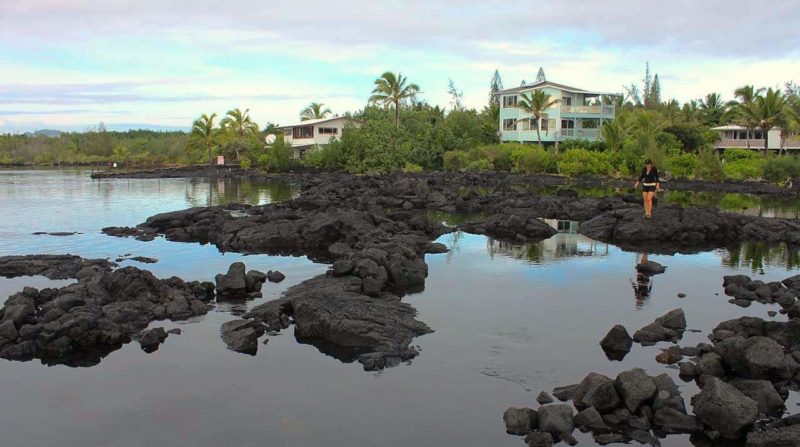 woman walking near the Kapoho tide pools