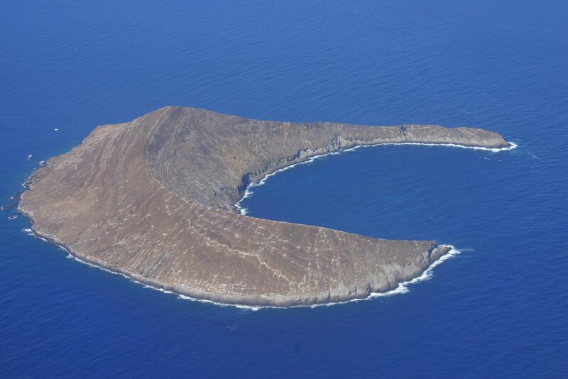 aerial image of the Lehua crater and surrounding ocean.