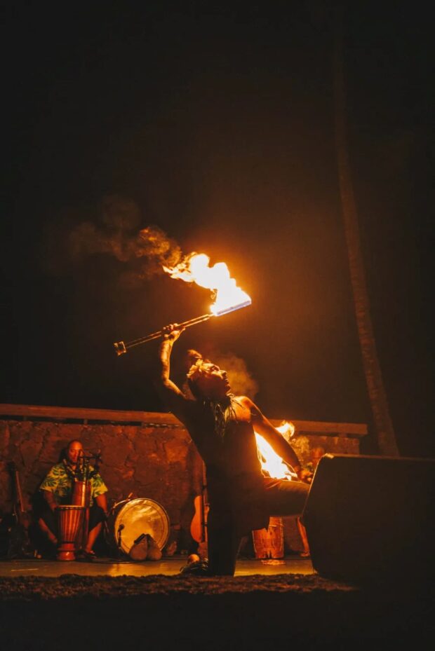 Samoan fire dancer performing at the Sunset Luau, Waikoloa Beach Marriott, Big Island Hawaii
