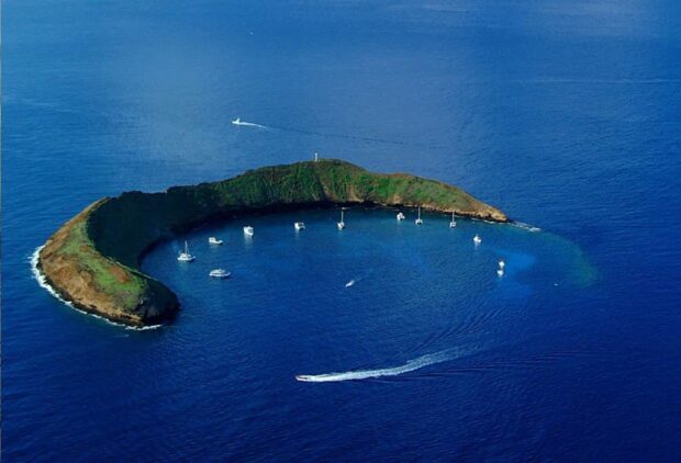 Molokini crater from the air with sailboats