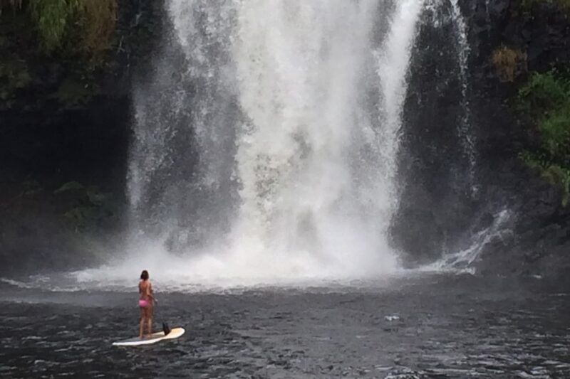 SUP under the Kulaniapia Fals in Hilo, Hawaiʻi