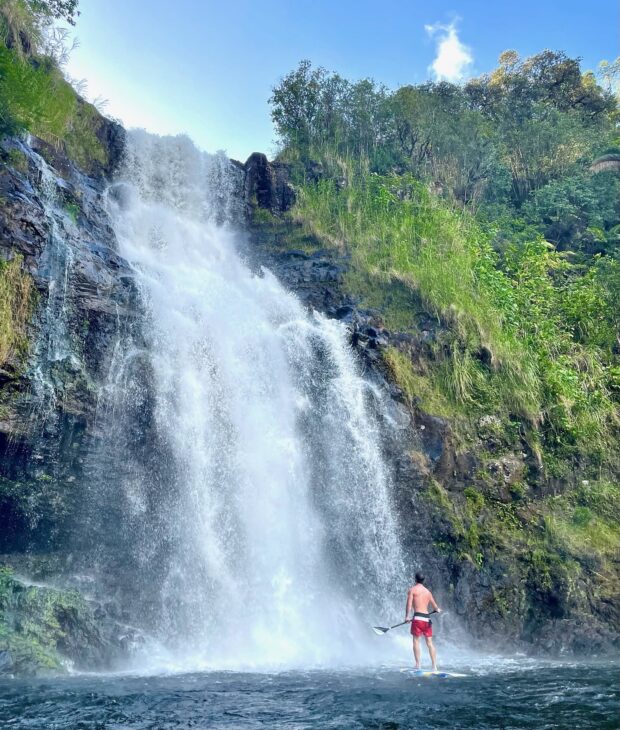 SUP under the Kulaniapia Fals in Hilo, Hawaiʻi