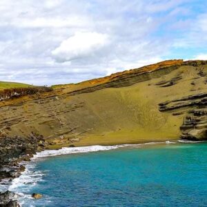 Papakōlea Green Sand Beach inside its eroded cinder cone bay