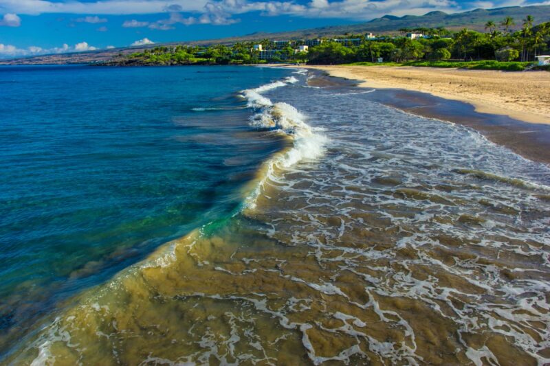 The largest of the island's white sand beaches, Hāpuna Beach has consistently been rated on international Top Ten lists of the islands' best beaches.