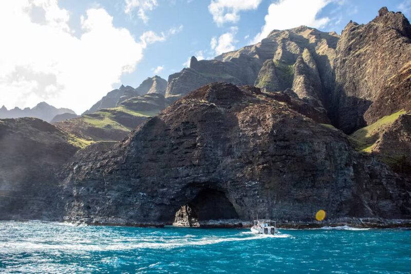 Explore ancient lava tubes that have eroded into sea caves. Image: Holoholo Charters.