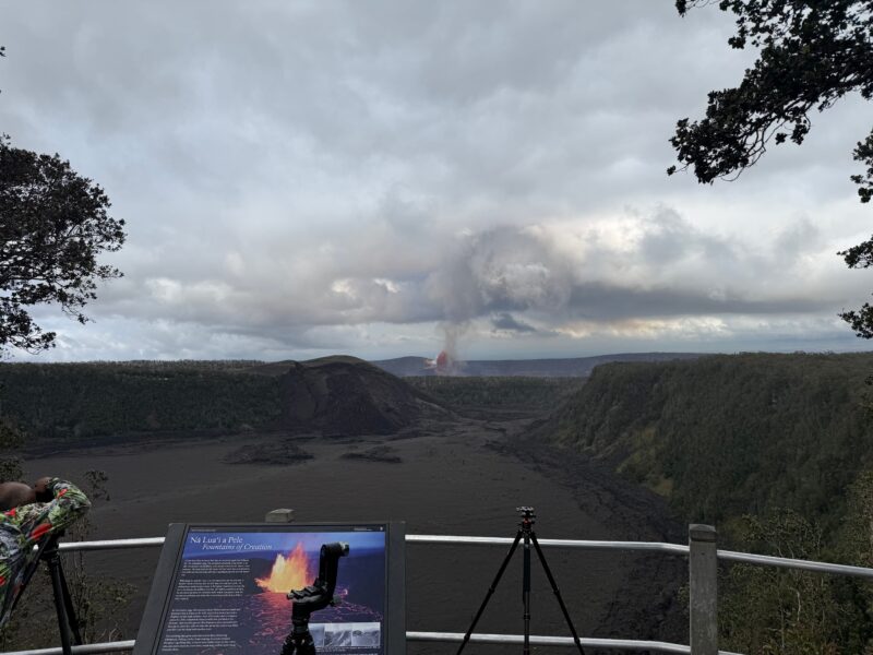 Lava fountaining during Kīlauea episode 47, photographed from the Kīlauea Iki Overlook in Hawaiʻi Volcanoes National Park, with the full caldera visible below
