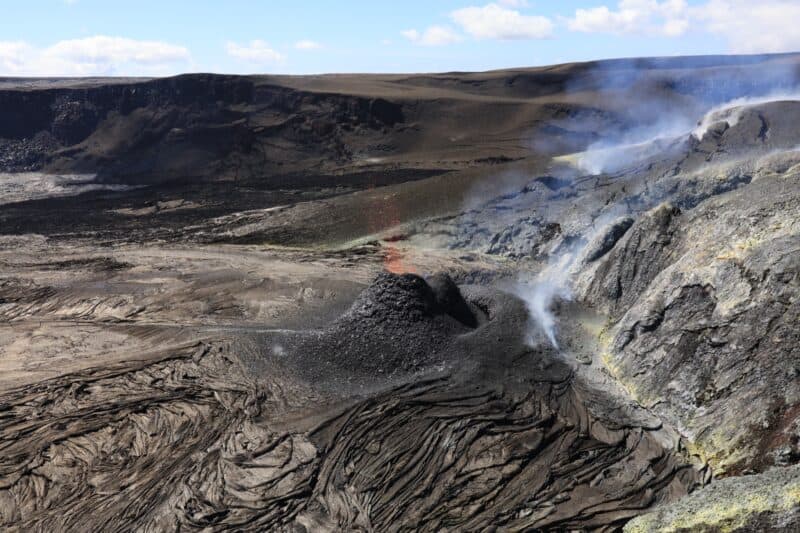 Kīlauea's north vent inside Halemaʻumaʻu crater spattering lava on September 15, 2026, atop the small cone it had built.