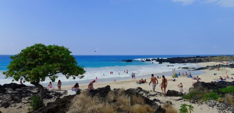 people on the beach of Kua Bay