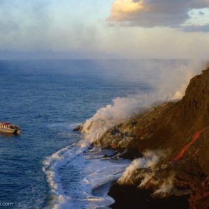 lava boat tour sees lava flowing into the ocean at the Big Island of Hawaii