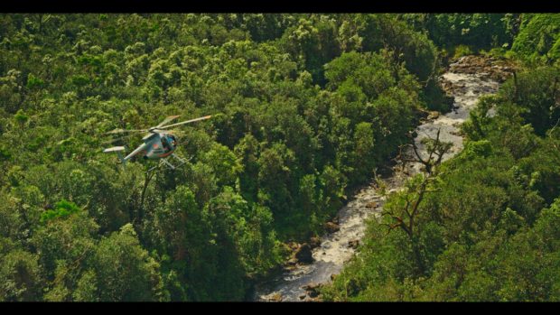 helicopter over river, hawaii