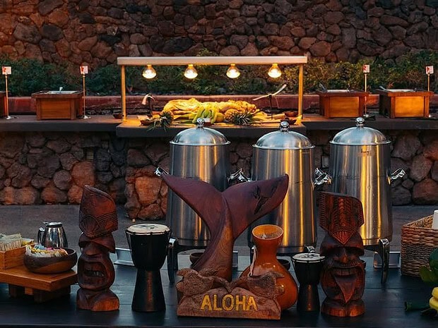 Hawaiian buffet spread at the Mauna Kea Luau including ahi poke and kalua pig, Big Island Hawaii