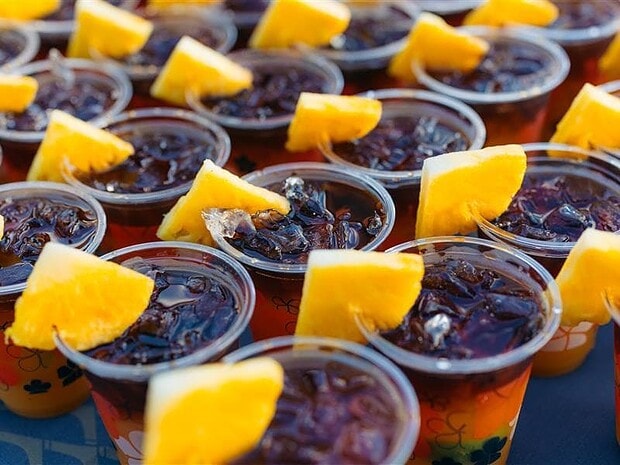 Mai tai welcome drinks on a table at the Mauna Kea Luau, Mauna Kea Beach Hotel, Big Island Hawaii