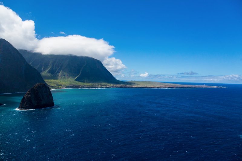 Sea cliffs at the Pali coast with Kalaupapa in the distance