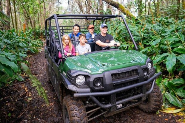 Guide driving UTV with two young children and two adults on the Polynesian Cultural ATV tour in Holualoa