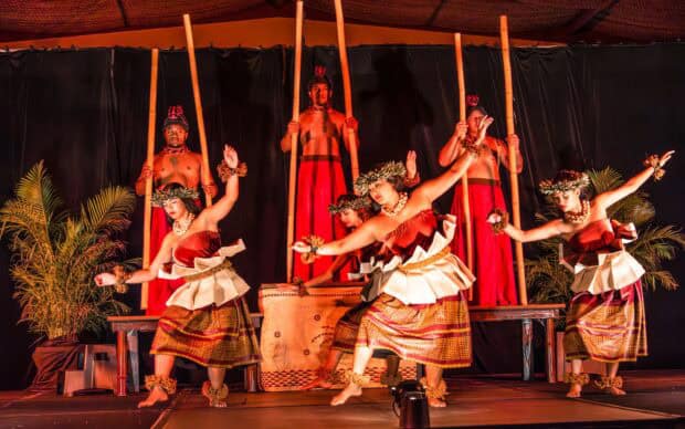 Dancers perform under the Aloha Garden Pavilion canopy at the Kapa Moe Lūʻau