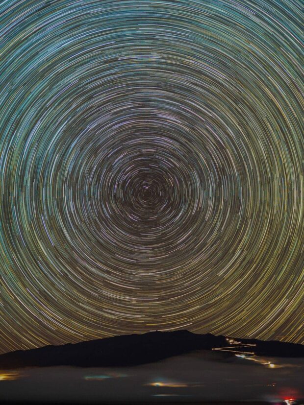 Long-exposure star trails circling above Mauna Kea