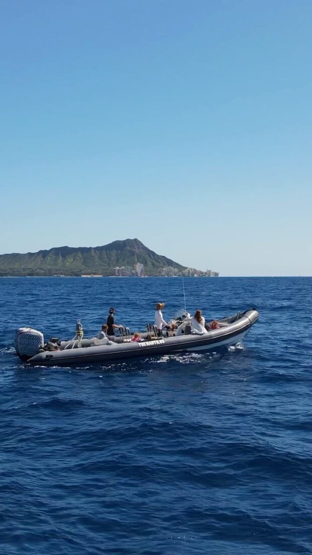 speedboat in front of diamond head